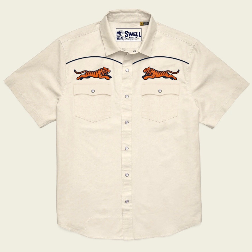 Front rendering of a cream short-sleeve pearl-snap shirt with twin embroidered tigers and navy piping.